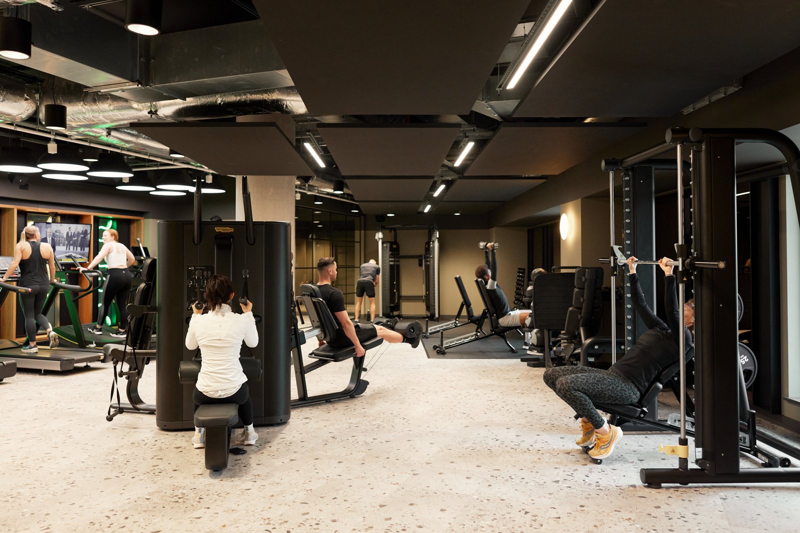 Residents training in an ALT RESIDE resident gym